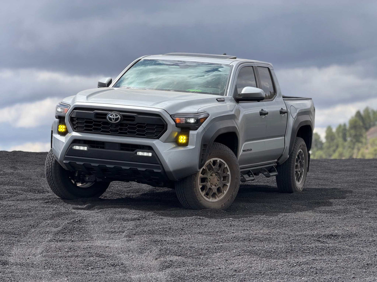 24+ Tacoma Vent Light Kit with OEM style fog light covers and LED pods installed on a 2024 Tacoma for enhanced off-road visibility