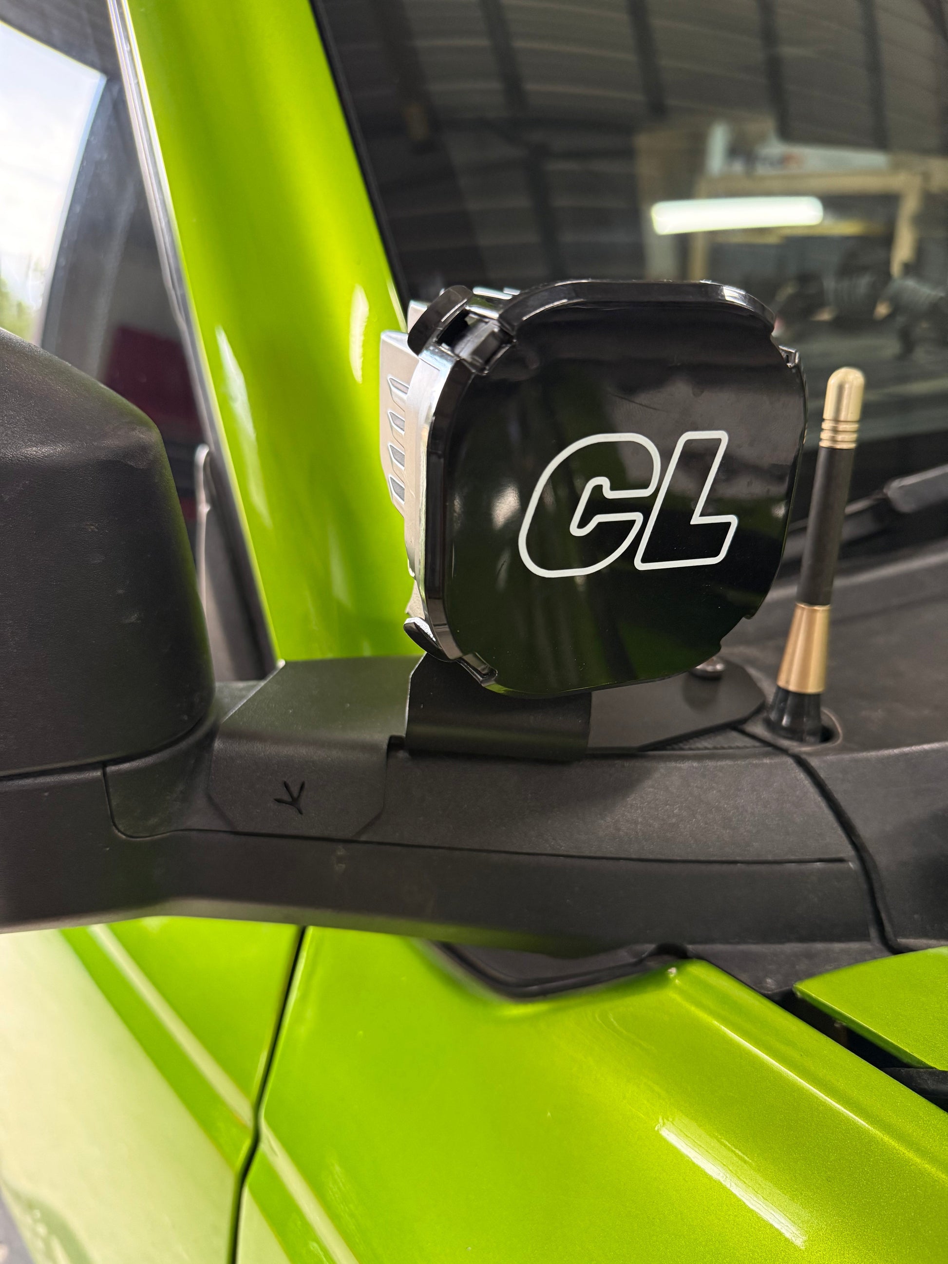 6th Gen Ford Bronco elevated stainless steel ditch light mount for reduced hood reflection