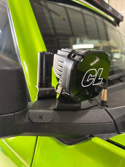 6th Gen Ford Bronco elevated stainless steel ditch light mount reducing hood reflection